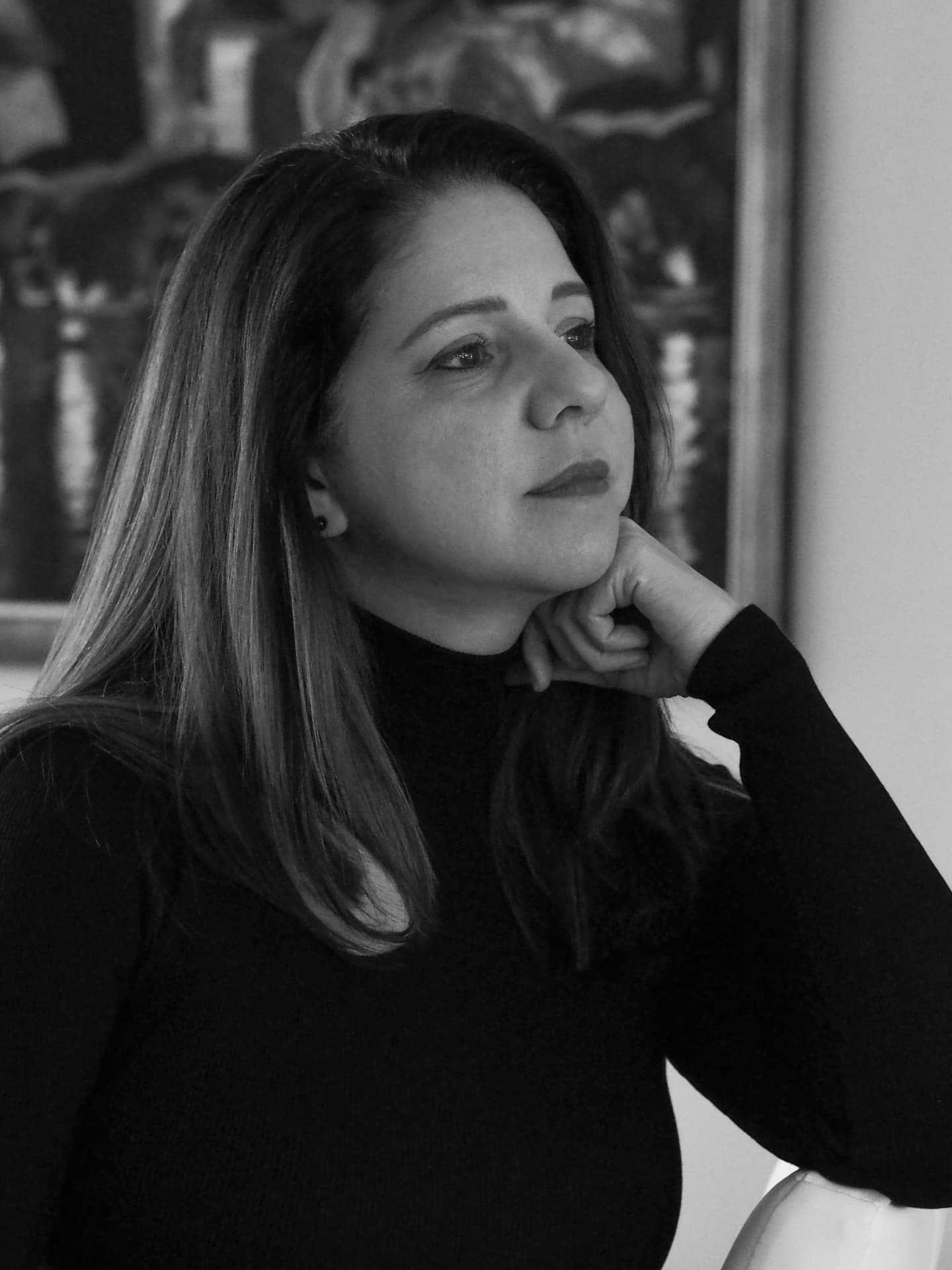 Cecile Umaña seated in a quiet interior, in conversation